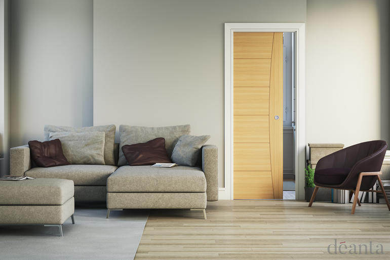 oak sliding pocket door in a living room setting 