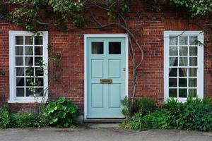 A light green heritage style front door